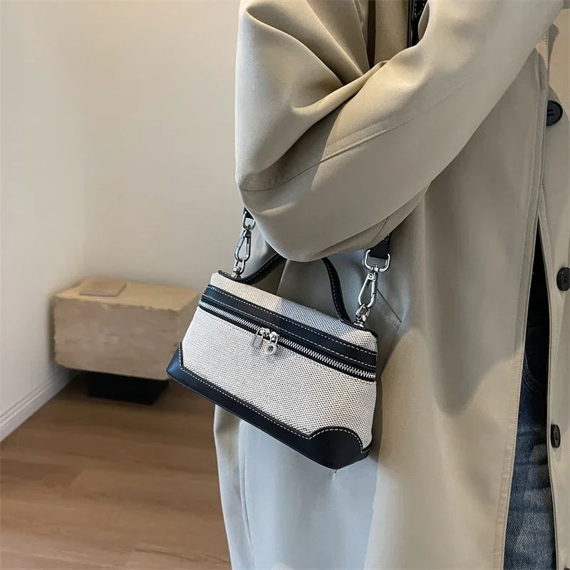 Satışa yüksek kaliteli tuval kadın kutusu omuzdan askili çanta 2024 yeni fermuar patchwork dikiş ipliği makyaj çantası moda crossbody çanta